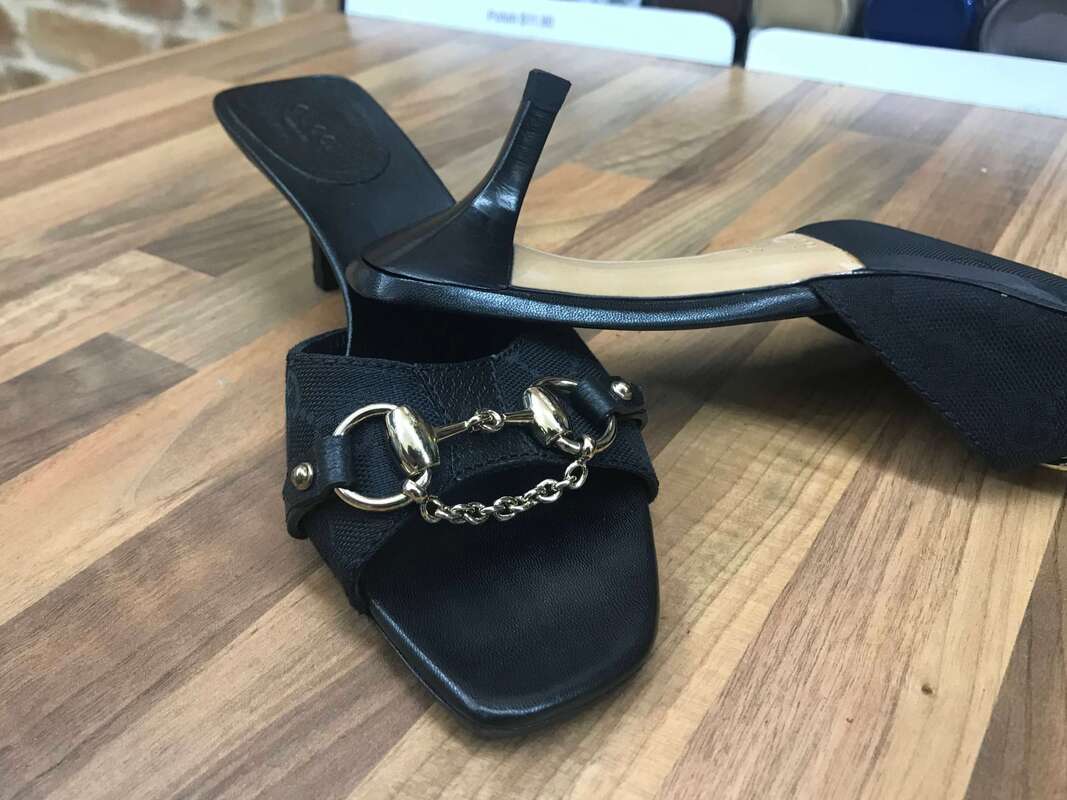 Expert Heel Tip Replacement on Black Gucci Slides