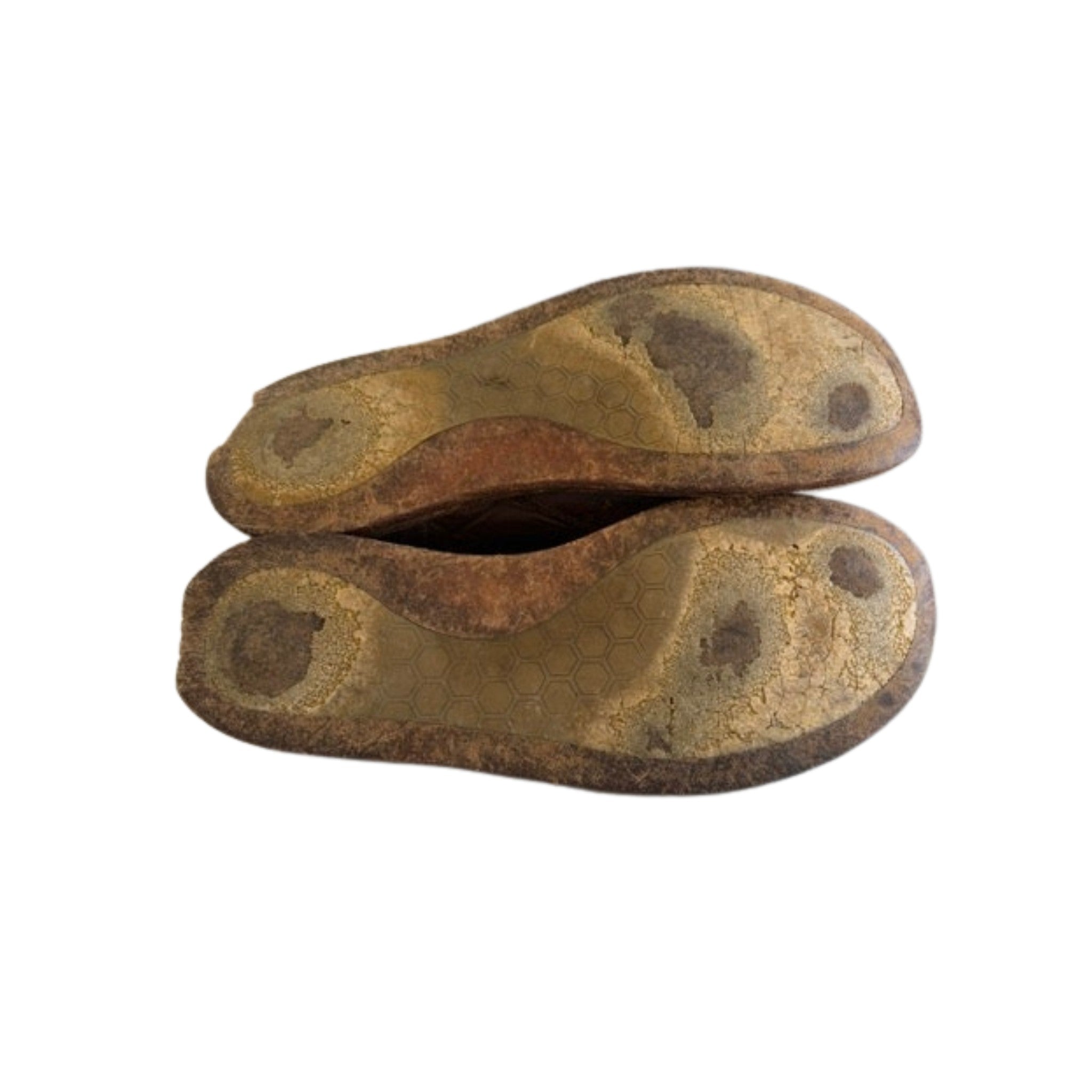 Pair of barefoot shoes with worn-through soles before resoling at Shane's Shoe Repairs